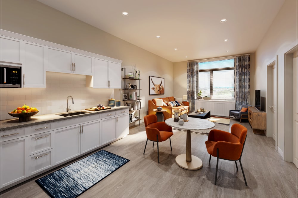 Apartment kitchen and living room at Anthology of The Arboretum in Austin, Texas