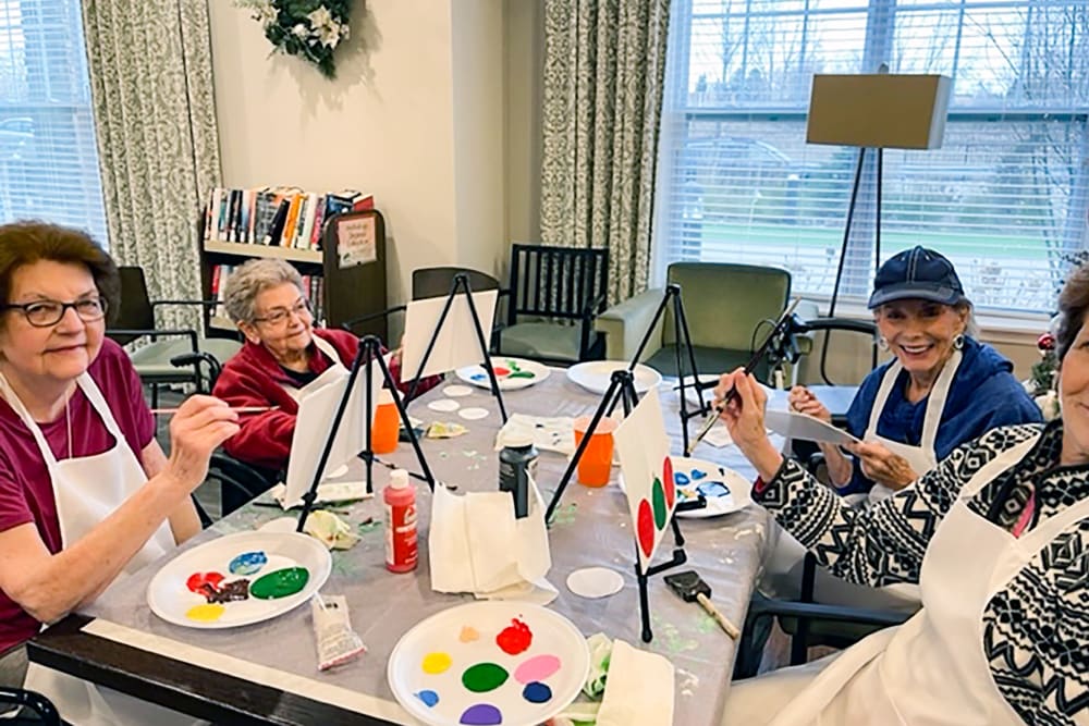 Group of residents painting at Anthology of Beaverton in Beaverton, Oregon
