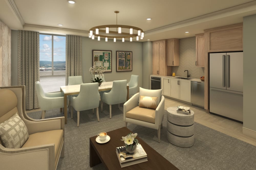 Resident apartment living room and kitchen at Anthology of Highland Park in Dallas, Texas
