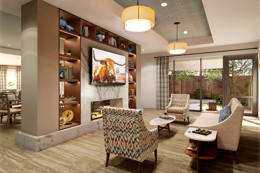 Lounge area with seating and large television at Anthology of The Arboretum in Austin, Texas